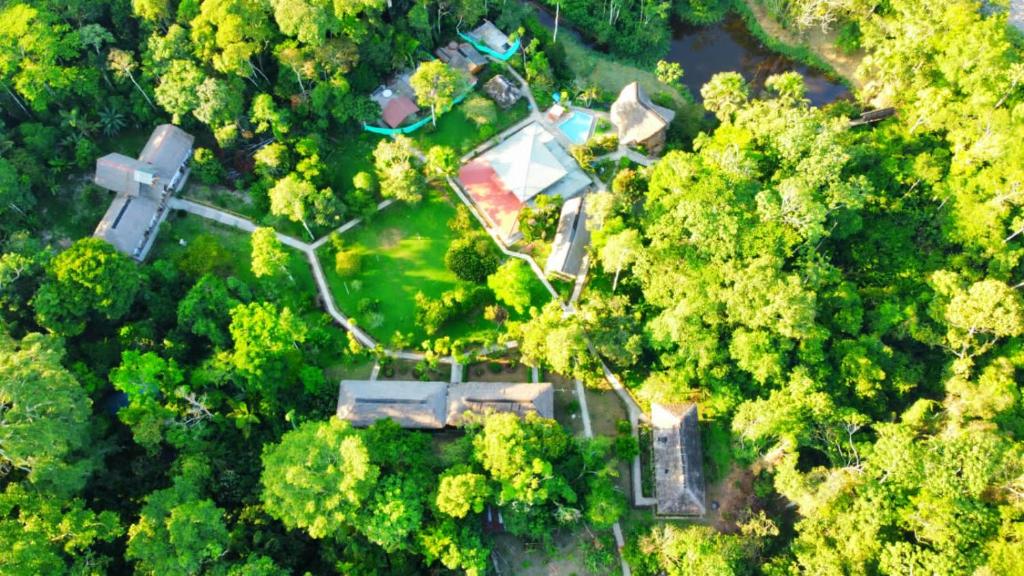 an overhead view of a house in a forest at Suchipakari Amazon Eco -Lodge & Jungle Reserve in Puerto Misahuallí