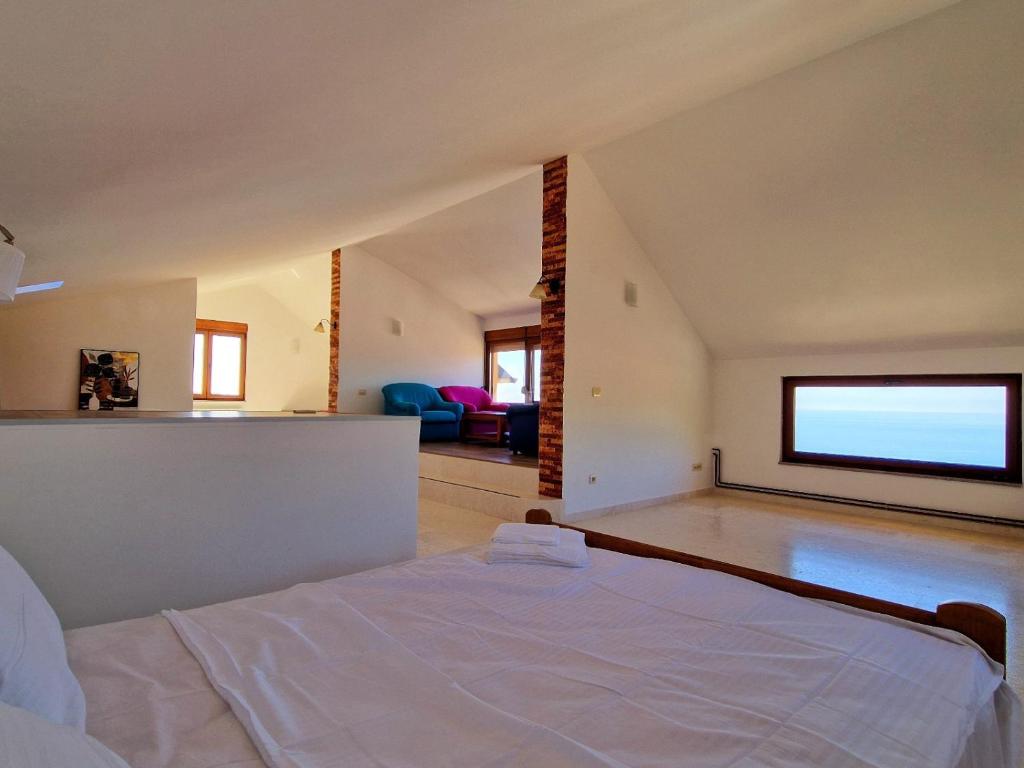 Postel nebo postele na pokoji v ubytování Luxury Villa Pontus