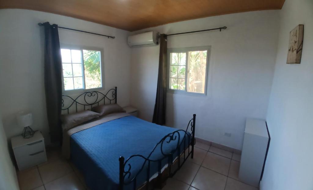 Postel nebo postele na pokoji v ubytování Hotel Cabañas Casita La Ermita