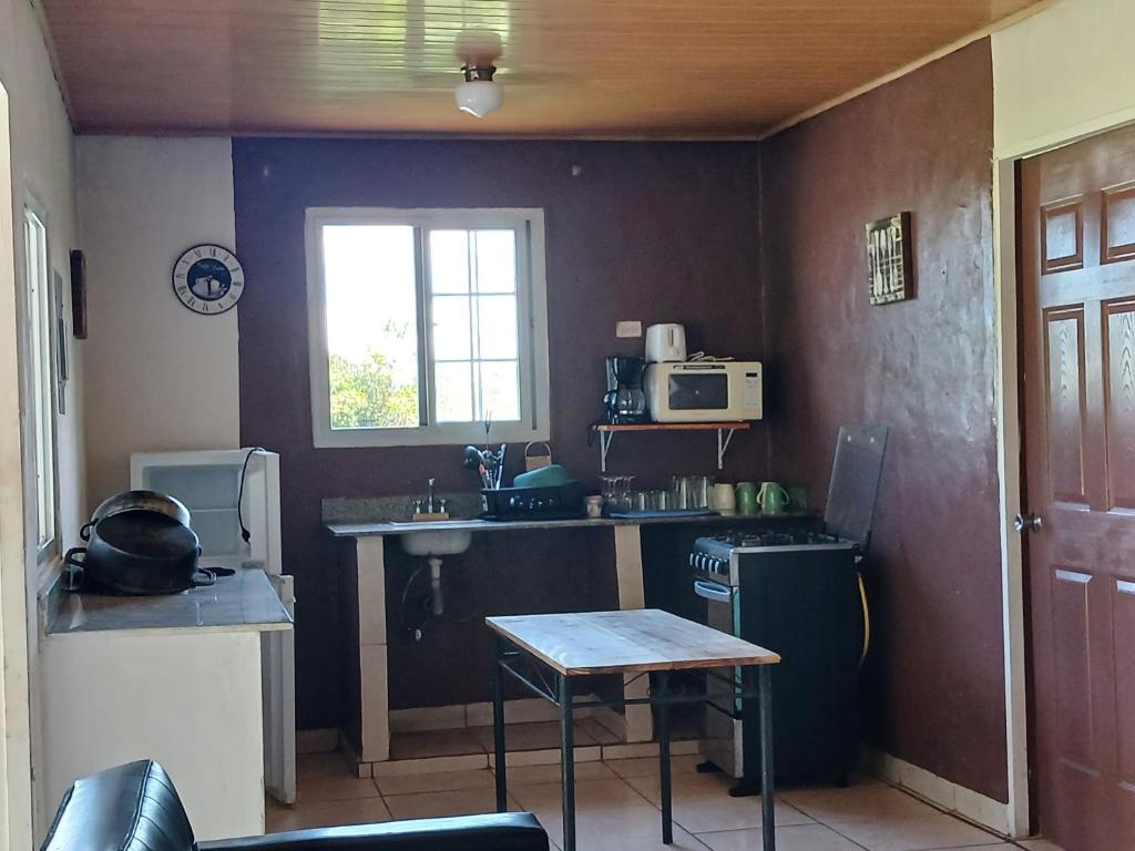 Kuchyň nebo kuchyňský kout v ubytování Hotel Cabañas Casita La Ermita