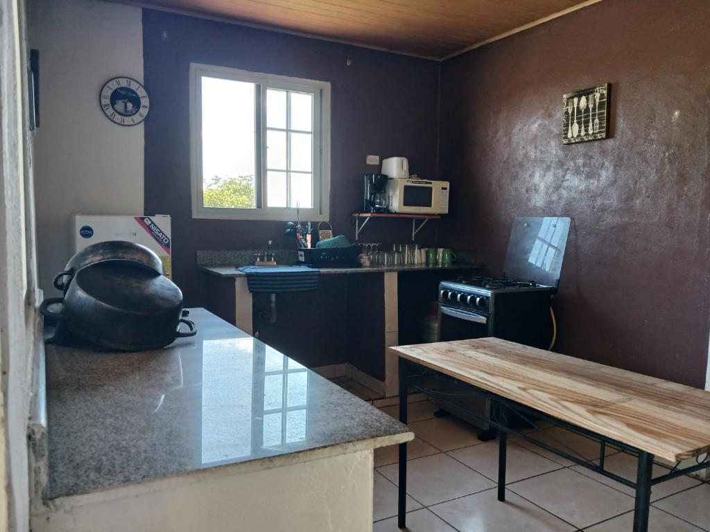 Kuchyň nebo kuchyňský kout v ubytování Hotel Cabañas Casita La Ermita