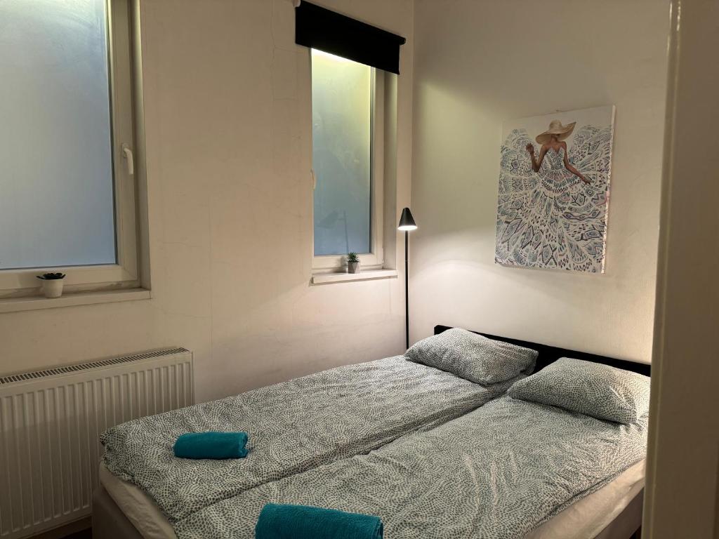Posteľ alebo postele v izbe v ubytovaní Stylish Apartment by the Vígszínház Theater