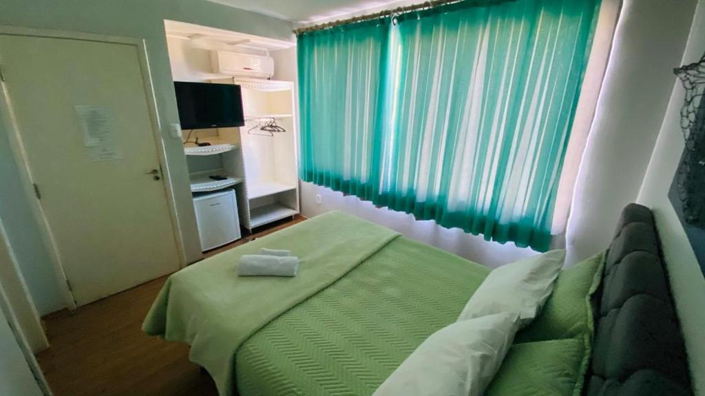 Postel nebo postele na pokoji v ubytování Hotel Domo