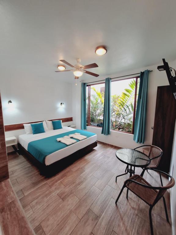 Voodi või voodid majutusasutuse Toucan Platinum Suites Aparthotel toas
