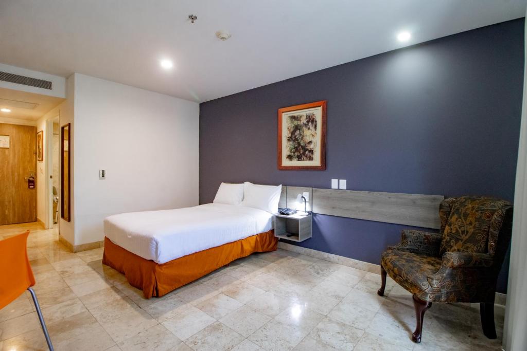 Postel nebo postele na pokoji v ubytování Memora Hotel & Villas Chapala
