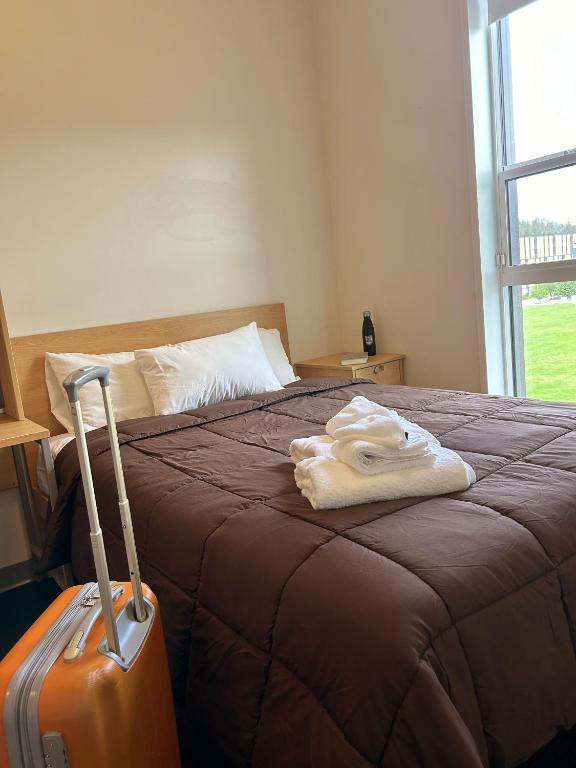 Postel nebo postele na pokoji v ubytování UBC Okanagan Campus