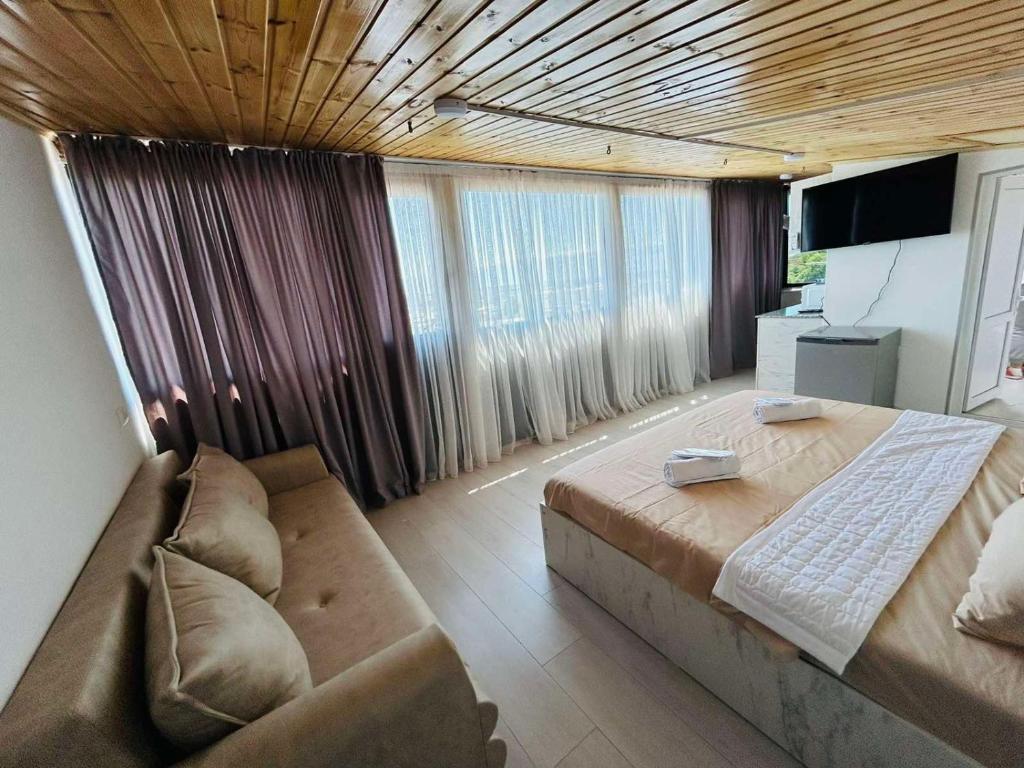 Posezení v ubytování Tskhumi Apartment