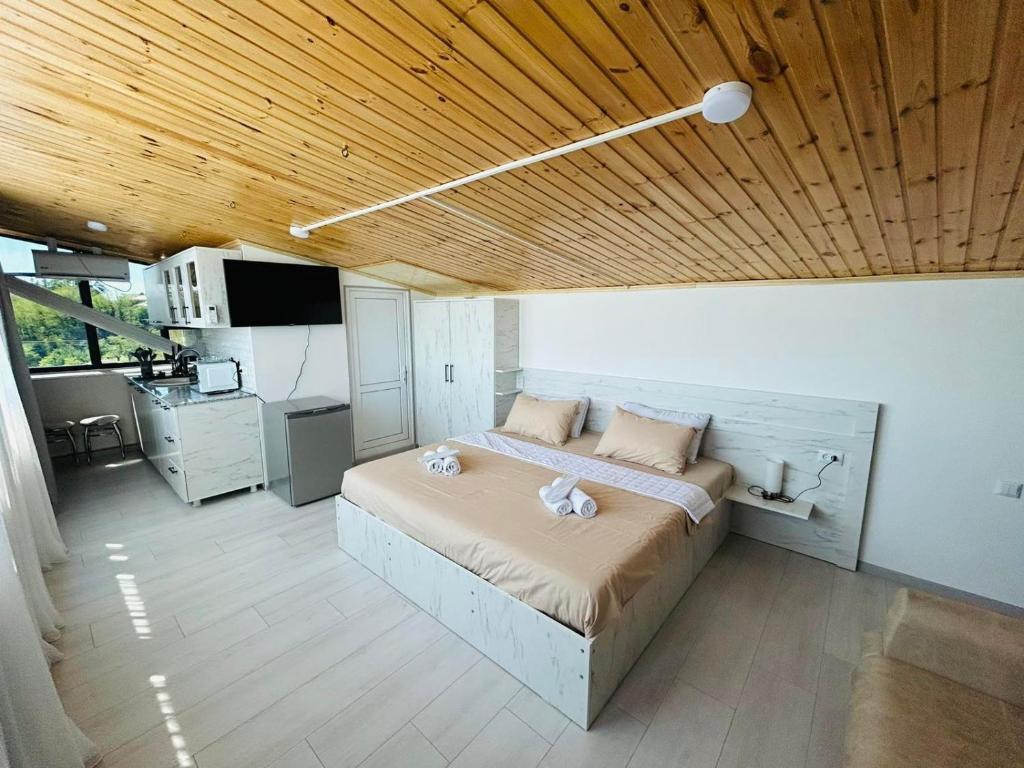 Kuchyň nebo kuchyňský kout v ubytování Tskhumi Apartment