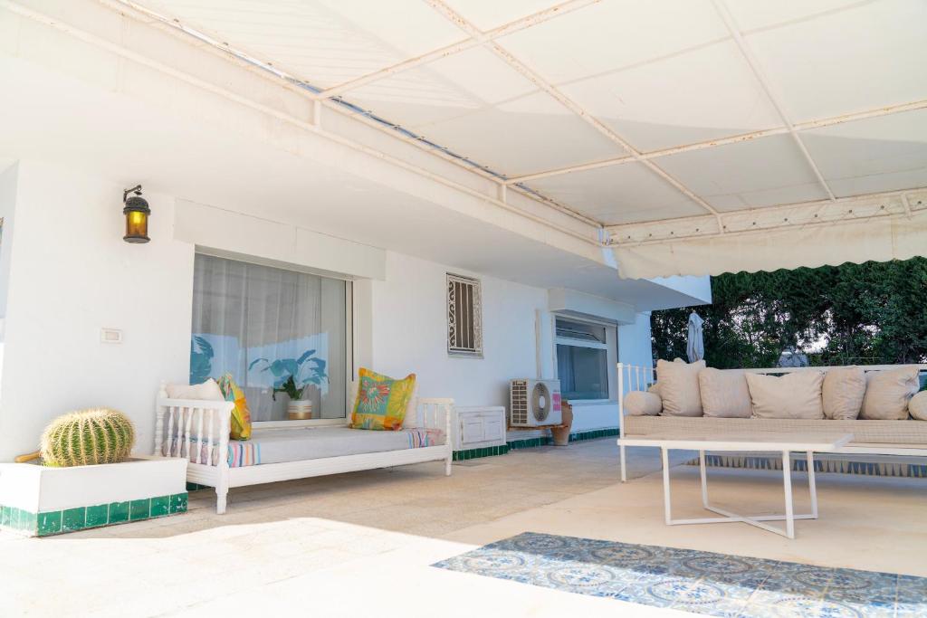 Posezení v ubytování Oasis Santorina Pool Sea Sky