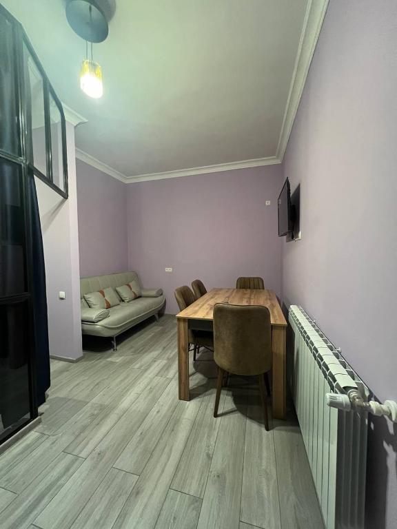 TV a/nebo společenská místnost v ubytování Apartment Merabi