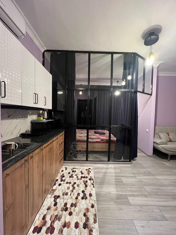 Kuchyň nebo kuchyňský kout v ubytování Apartment Merabi