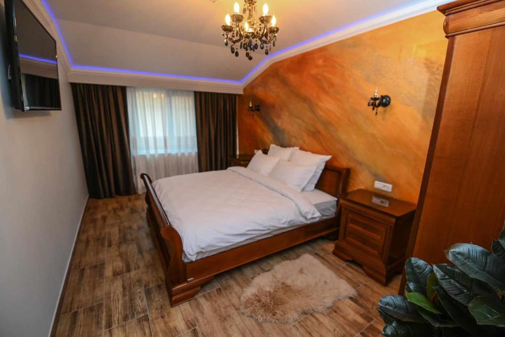 Postel nebo postele na pokoji v ubytování Nevan Luna Home