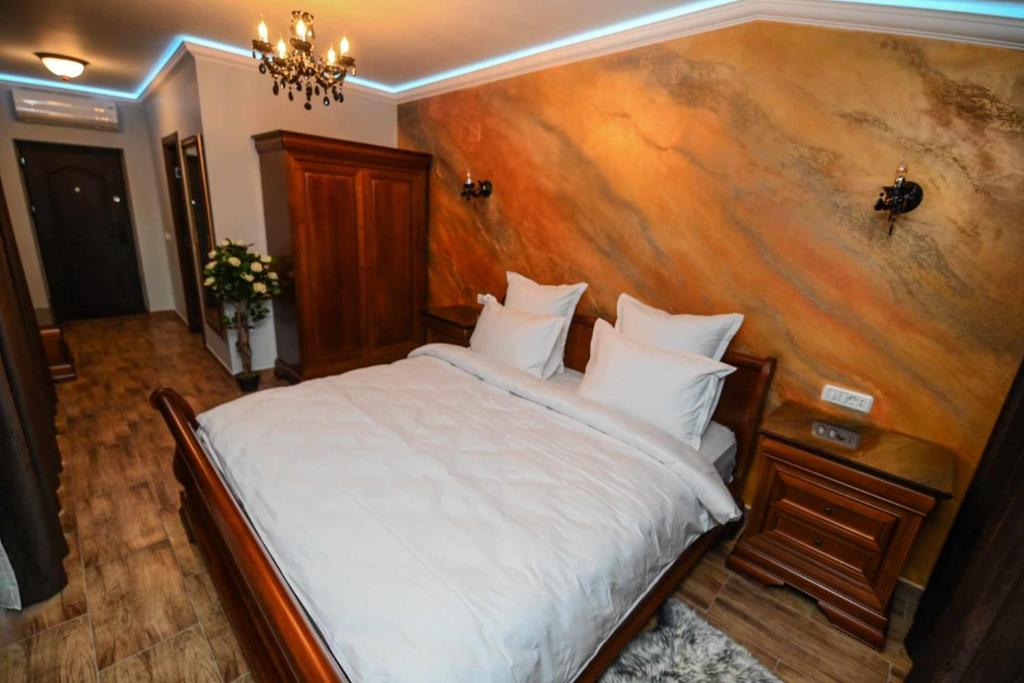 Postel nebo postele na pokoji v ubytování Nevan Luna Home