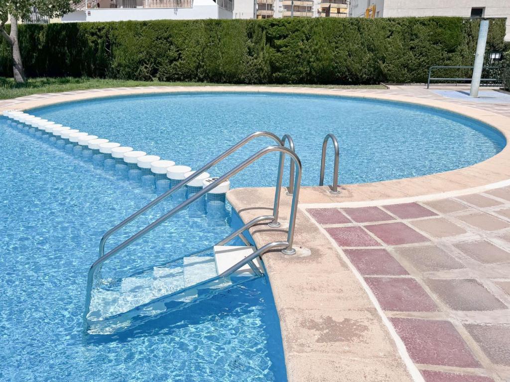 Bazén v ubytování Bright 2 Bed Apartment with pool - Solo Familias nebo v jeho okolí