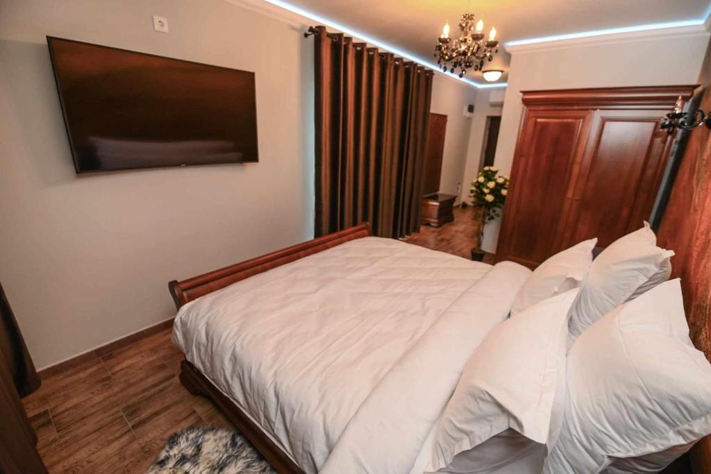 Postel nebo postele na pokoji v ubytování Nevan Luna Home