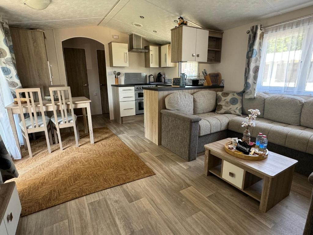 Kuchyň nebo kuchyňský kout v ubytování Mobil-home tout confort