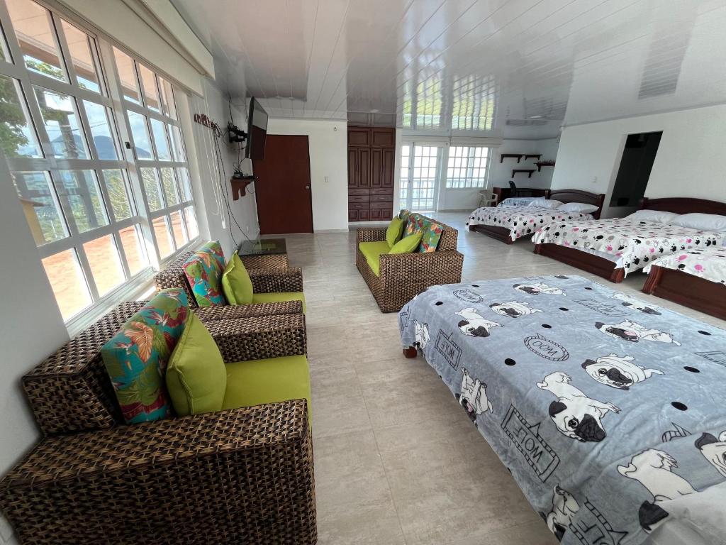 Postel nebo postele na pokoji v ubytování Mirador El paraiso glamping