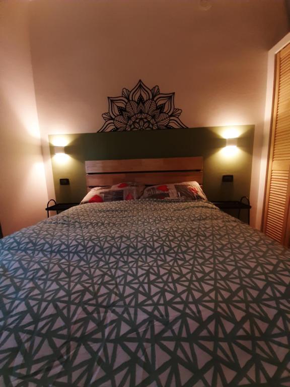 Postel nebo postele na pokoji v ubytování Mami home