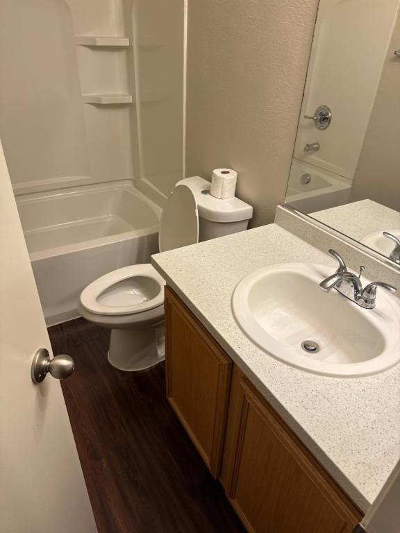 a bathroom with a sink and a toilet at Strip in Las Vegas