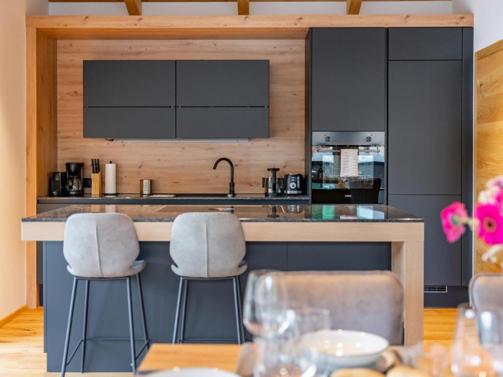 A kitchen or kitchenette at Luxury Sankt Lorenzen