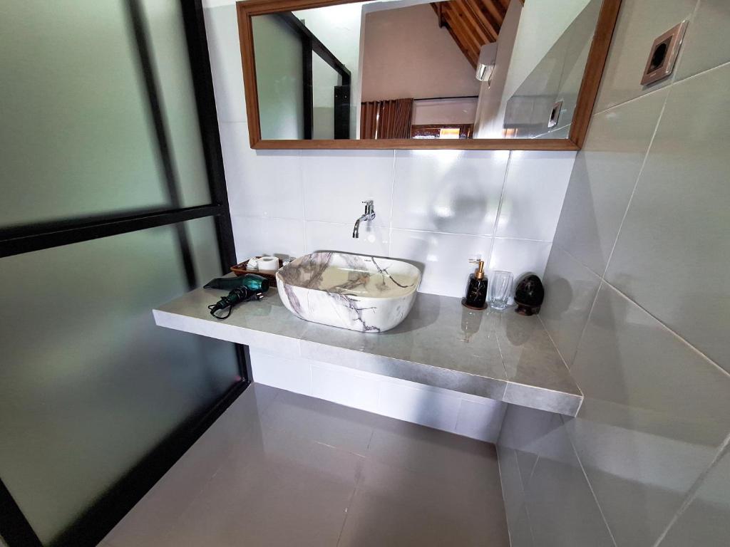 Koupelna v ubytování Novia Guest House Lombok-Tetebatu