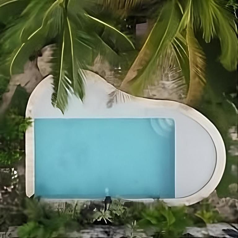 Bazén v ubytování Zamunda Garden View nebo v jeho okolí