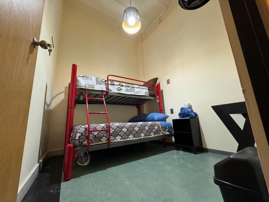 Postel nebo postele na pokoji v ubytování Rooms Zocalo