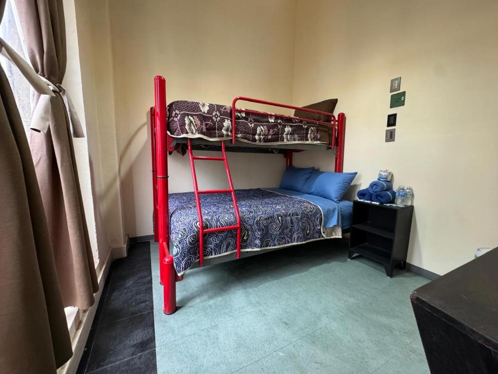 Postel nebo postele na pokoji v ubytování Rooms Zocalo