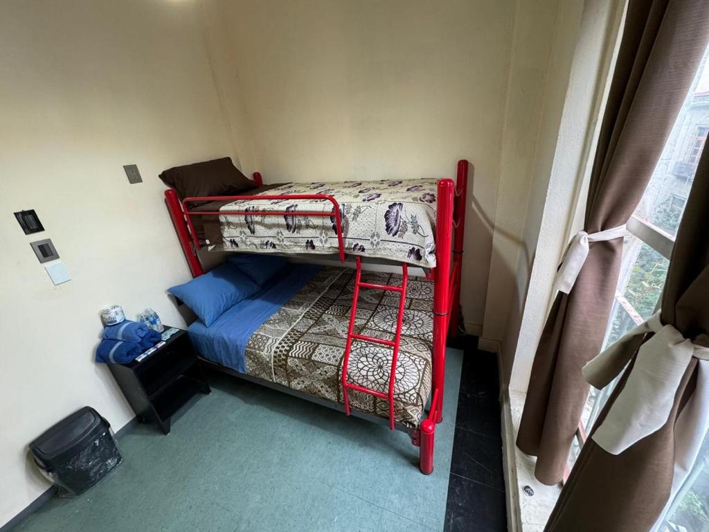 Postel nebo postele na pokoji v ubytování Rooms Zocalo