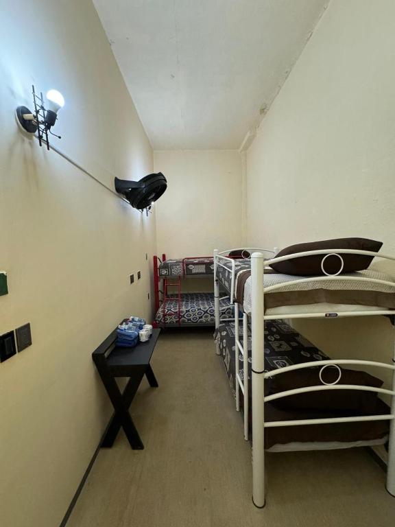 Postel nebo postele na pokoji v ubytování Rooms Zocalo