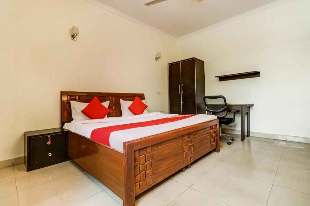 Cama o camas de una habitación en OYO Rajvanshi Palace