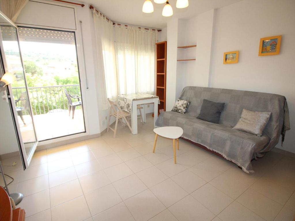 Posedenie v ubytovaní Apartamento con terraza a 150 m de la playa de Grifeu, ideal para 4 personas - ES-228-50