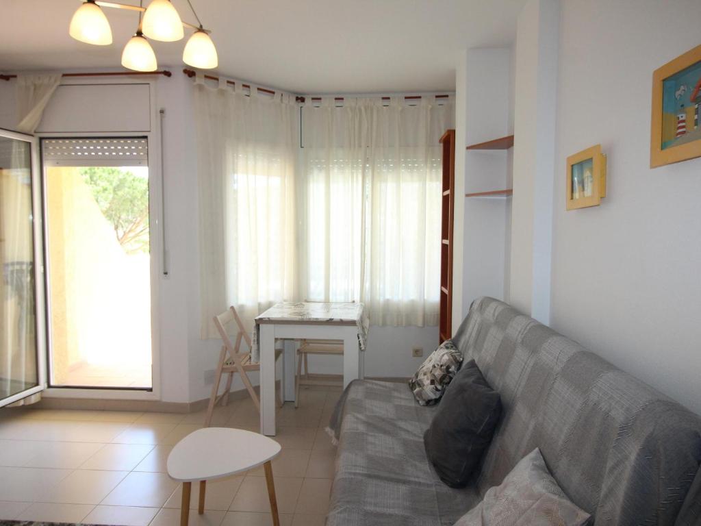 Posedenie v ubytovaní Apartamento con terraza a 150 m de la playa de Grifeu, ideal para 4 personas - ES-228-50