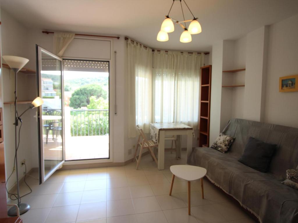 Posedenie v ubytovaní Apartamento con terraza a 150 m de la playa de Grifeu, ideal para 4 personas - ES-228-50