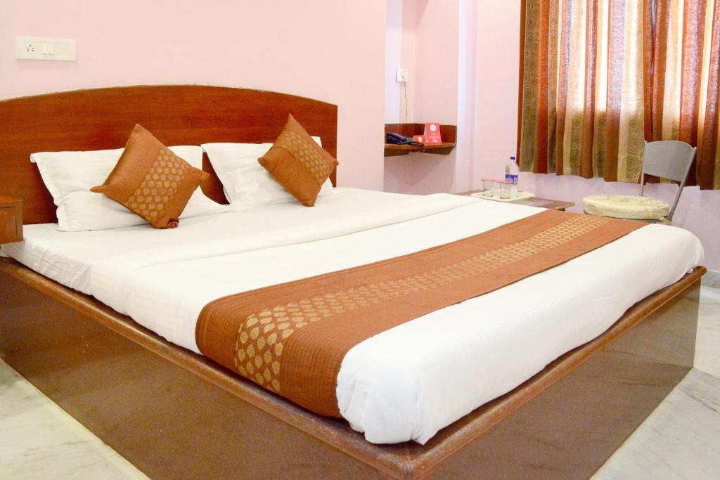 Krevet ili kreveti u jedinici u okviru objekta Collection O Hotel Konark Palace