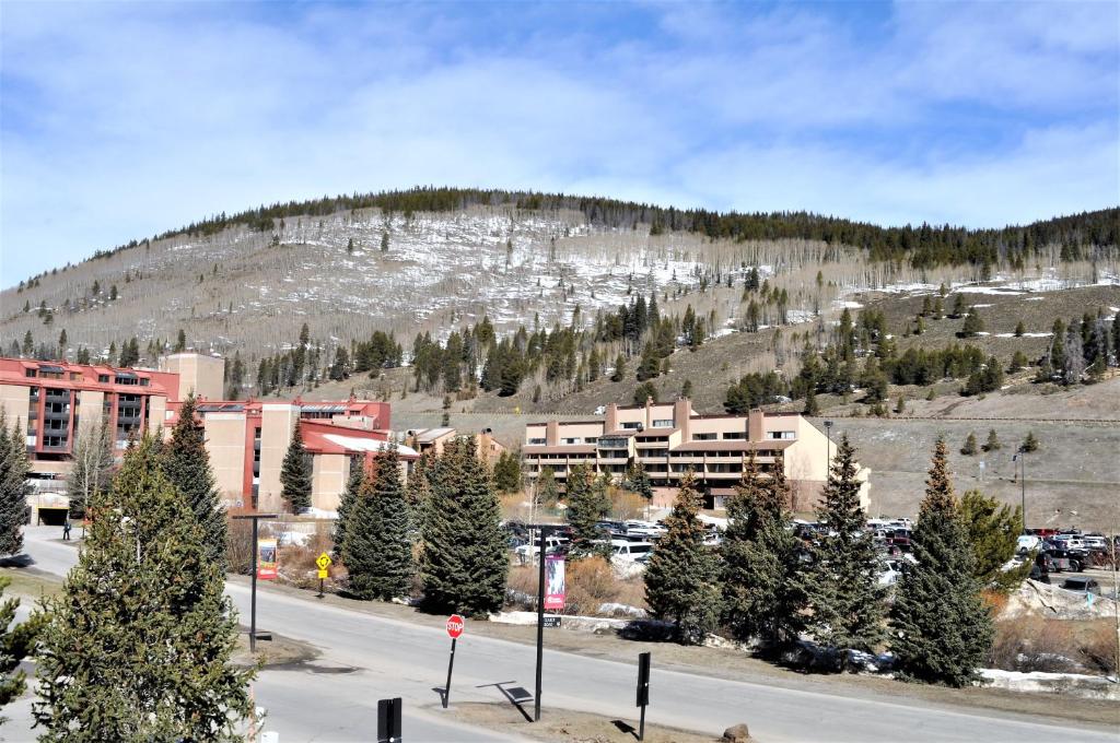 a city with trees and a mountain in the background at Summit House 2 bed 2 bath SHGW in Copper Mountain