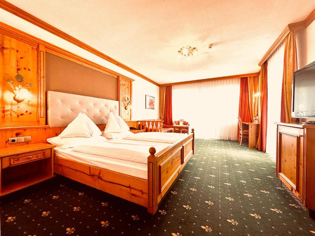 Postel nebo postele na pokoji v ubytování Hotel Das Urbisgut