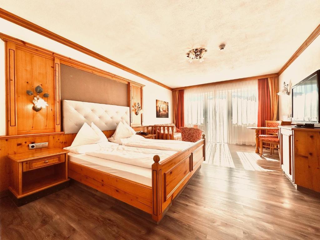 Postel nebo postele na pokoji v ubytování Hotel Das Urbisgut