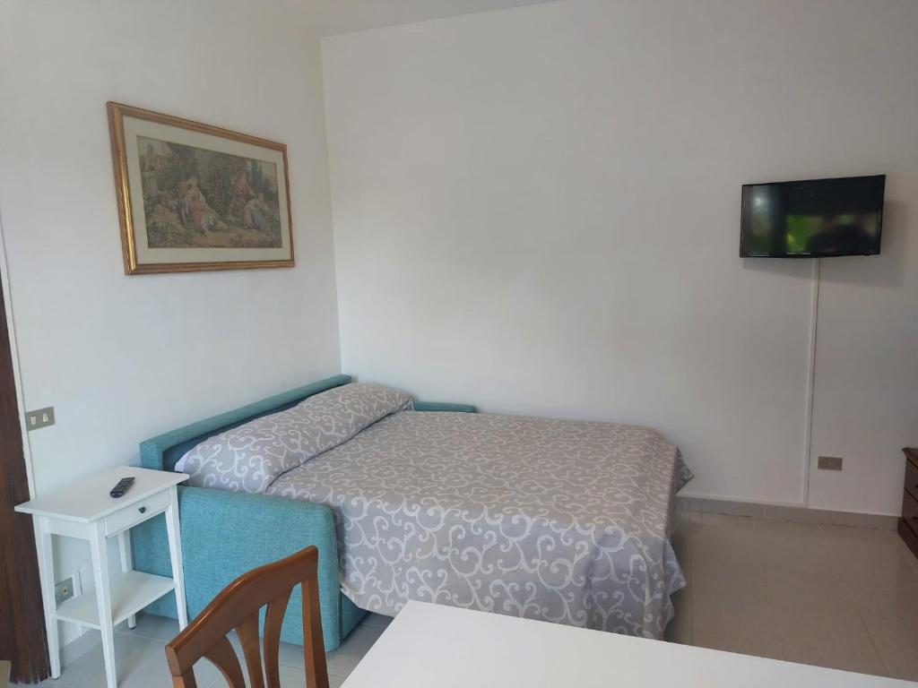 Posteľ alebo postele v izbe v ubytovaní Casa immersa nel verde del parco del Conero