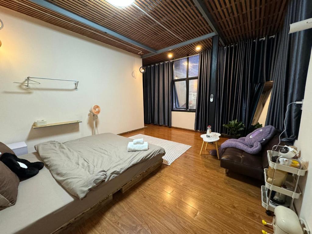 Postel nebo postele na pokoji v ubytování Baos Home