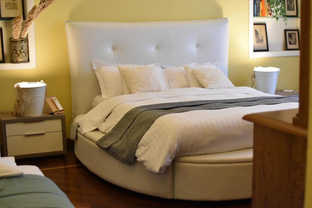 Кровать или кровати в номере queen 24