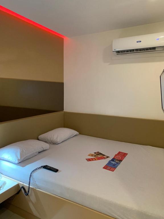 Postel nebo postele na pokoji v ubytování Hotel Sogo Bacoor