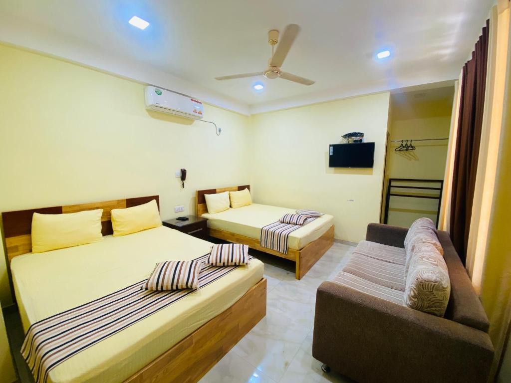 Postel nebo postele na pokoji v ubytování Sparkling Resort Kataragama