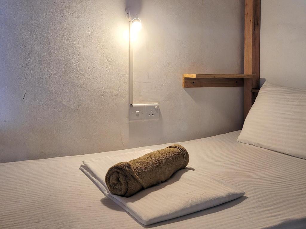 Postel nebo postele na pokoji v ubytování Agra Arugambay