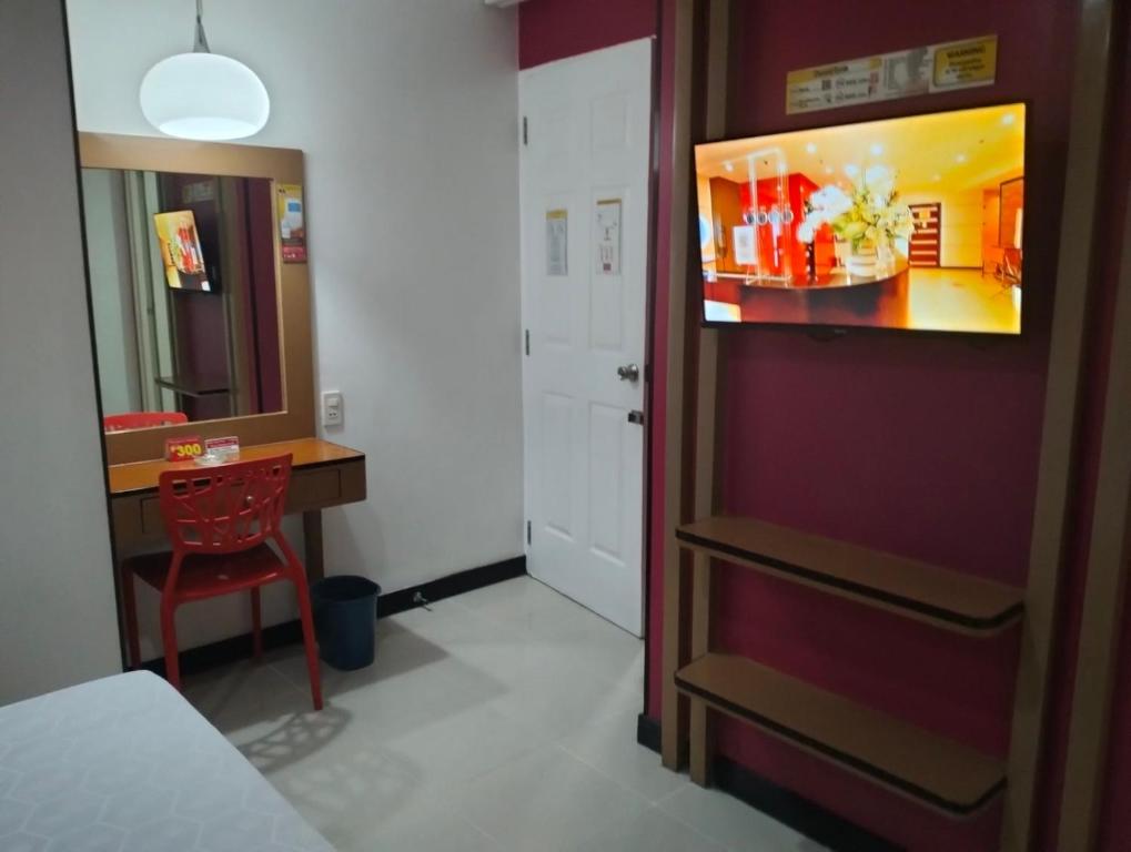 TV a/nebo společenská místnost v ubytování Hotel Sogo Banawe