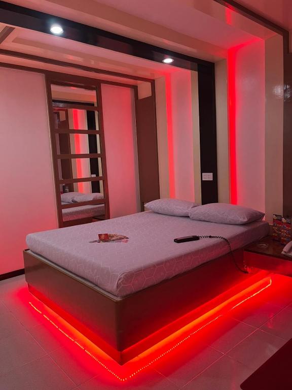 Postel nebo postele na pokoji v ubytování Hotel Sogo Quirino