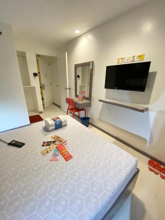TV a/nebo společenská místnost v ubytování Hotel Sogo - EDSA Trinoma