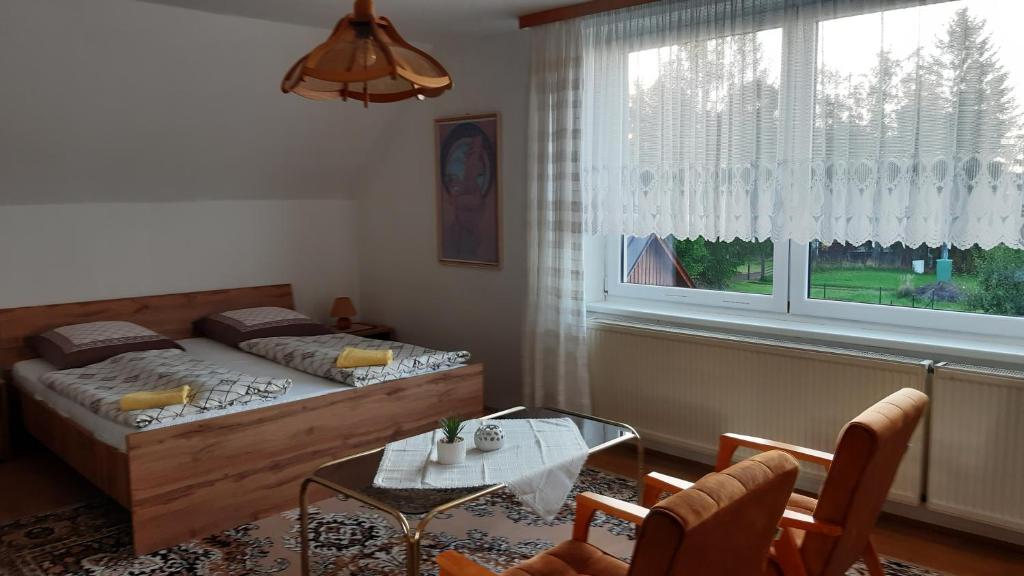 Postel nebo postele na pokoji v ubytování Pension Kristýna