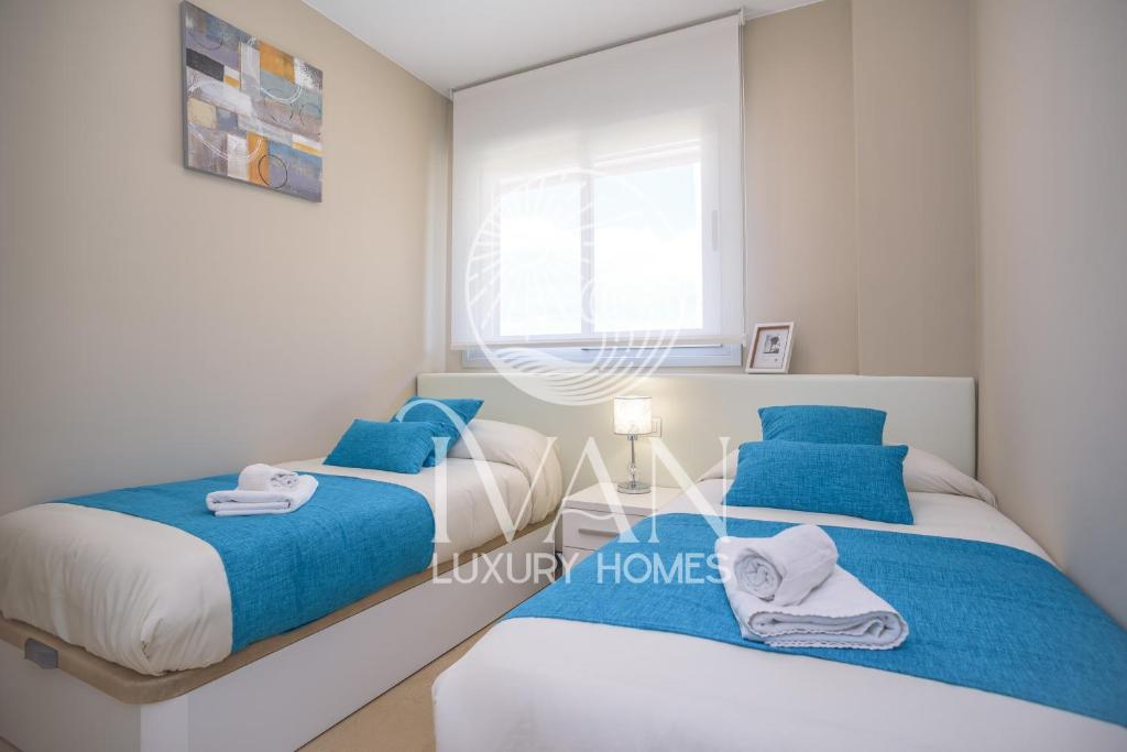 Postel nebo postele na pokoji v ubytování Casa Seabreeze Ivan Luxury Homes 8ªPlta Norte 1ªLínea
