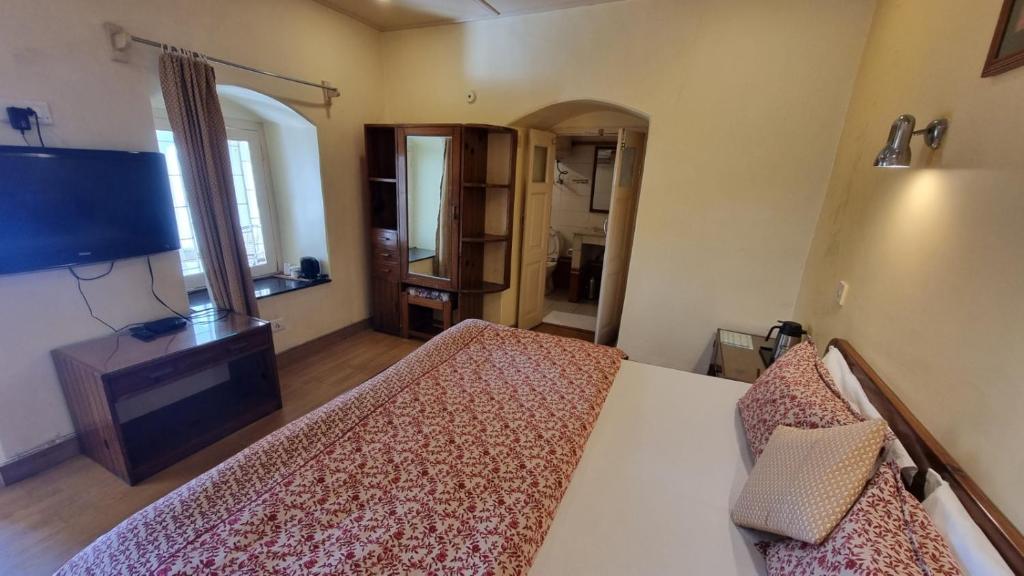 TV a/nebo společenská místnost v ubytování Hotel Padmini NIvas